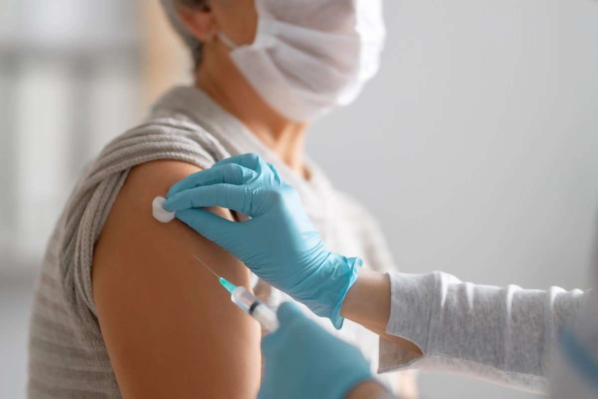 Image of a patient getting a covid booster vaccine