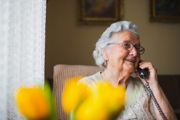 image of elderly patient on the phone