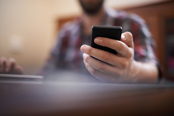 image of patient receiving a text message